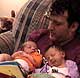 Dad reads a little Dr. Seuss to some very interested girls